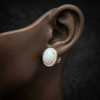 10k Yellow Gold Oval Opal Diamond Earrings 3/8 Cttw displayed on ear - GOLDZENN