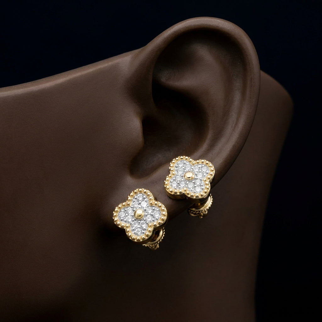 14k Yellow Gold Diamond Clover Earrings 1/6 Cttw displayed on ear - GOLDZENN