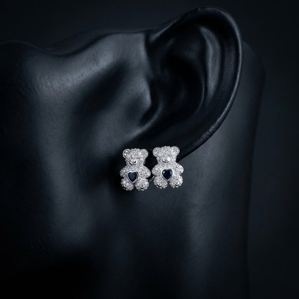 1/2CTW Teddy Bear Diamond Earrings in 10K White Gold displayed on ear - GOLDZENN
