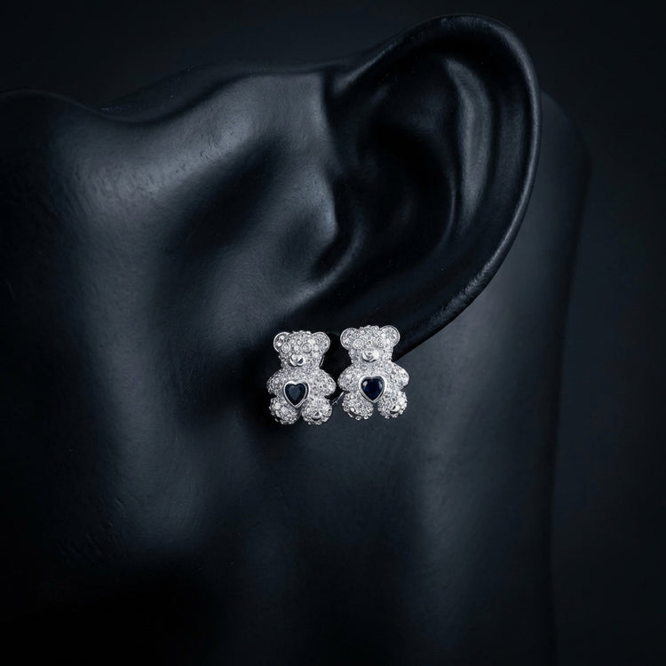 1/2CTW Teddy Bear Diamond Earrings in 10K White Gold displayed on ear - GOLDZENN