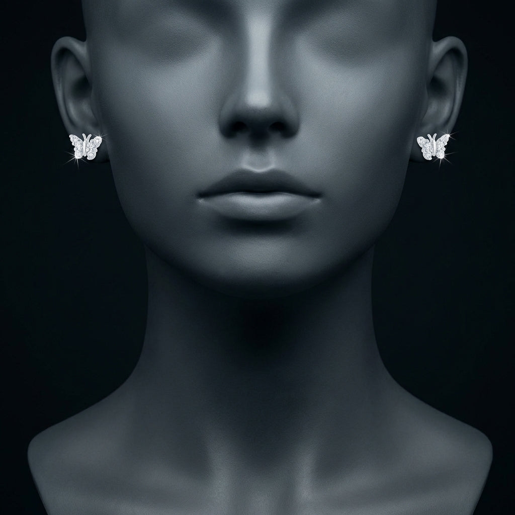 10k White Gold Diamond Butterfly Earrings 1/5 Cttw displayed on ear - GOLDZENN