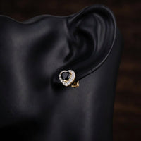 1/5CTW Diamond & Heart Black Onyx Earrings 10K Gold displayed on ear - GOLDZENN