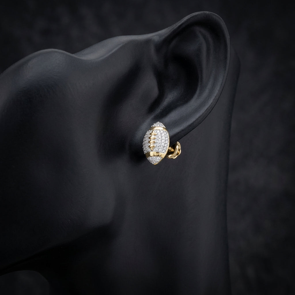10k Gold Diamond Football Earrings 1/3 Cttw displayed on ear - GOLDZENN