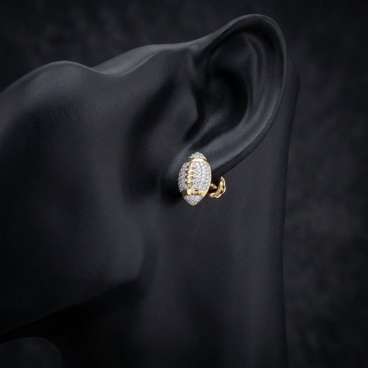 10k Gold Diamond Football Earrings 1/3 Cttw displayed on ear - GOLDZENN