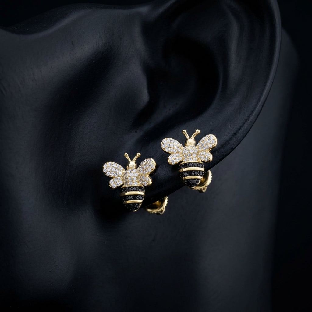 Black Diamond Honey Bee Earrings in 10K Yellow Gold displayed on ear - GOLDZENN