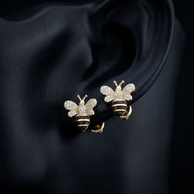 Black Diamond Honey Bee Earrings in 10K Yellow Gold displayed on ear - GOLDZENN