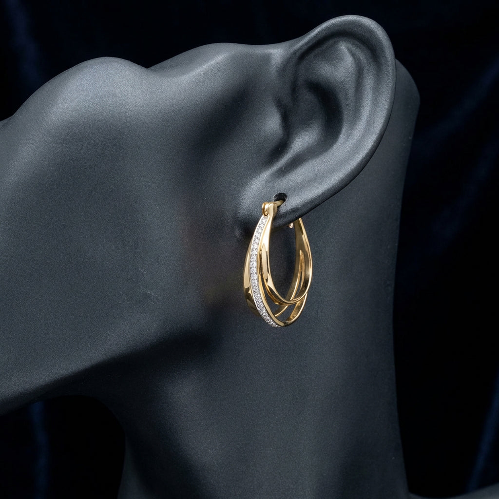 10k Yellow Gold Round Diamond Hoop Earrings 1/10 Cttw displayed on ear - GOLDZENN