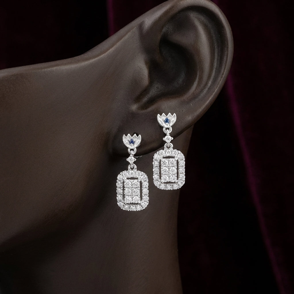 14K White Gold Diamond Rectangle Dangle Earrings displayed on ear - GOLDZENN