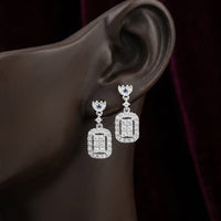 14K White Gold Diamond Rectangle Dangle Earrings displayed on ear - GOLDZENN