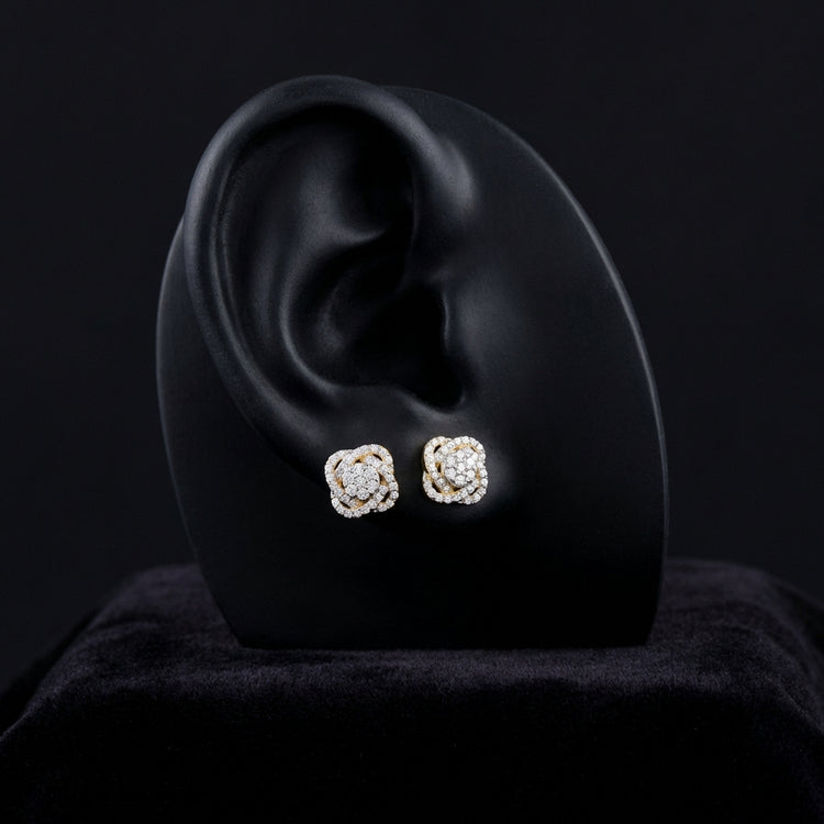 5/8CT Natural Diamond Flower Earrings in 10k Gold displayed on ear - GOLDZENN