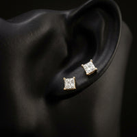 14k Yellow Gold Princess Diamond Solitaire Earrings 1CTTW displayed on ear - GOLDZENN