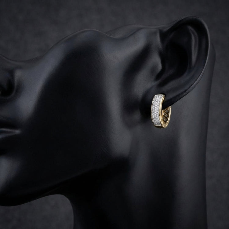 1/3CTW Diamond Hoop Earrings in 10K Yellow Gold displayed on ear - GOLDZENN