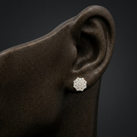Yellow-Tone Moissanite Round Stud Earrings | 925 Silver displayed on ear - GOLDZENN