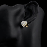 10k Gold Diamond Heart Earrings 1/5 CTTW displayed on ear - GOLDZENN