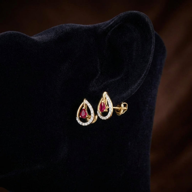 14k Yellow Gold Diamond Fashion Earrings 1/8 CTW displayed on ear - GOLDZENN