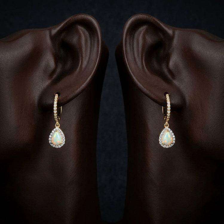 10k Yellow Gold Pear Opal Diamond Dangling Earrings displayed on ear - GOLDZENN
