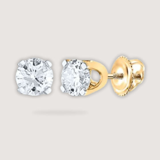 alt=" Elevate your elegance with 3/4CTW diamond solitaire earrings in 14K yellow gold. Perfect for any occasion, these diamonds add timeless glamour. "