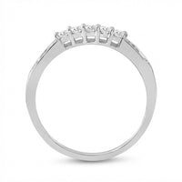 A close-up of the 14k White Gold Princess Diamond Bridal Ring Set 1 Cttw, featuring five princess-cut diamonds in a row, displayed on a plain white background.