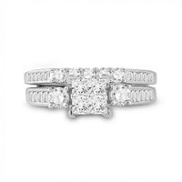 The 14k White Gold Princess Diamond Bridal Ring Set 1 Cttw showcases four princess-cut center diamonds with additional round and baguette-cut diamonds along the bands for a dazzling bridal look.