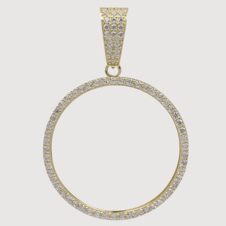 The 10k Solid Gold Picture Pendant with CZ Stones features an open oval design, sparkling CZ stones on the outline and bail, and offers a minimalist yet personal touch to any look. Customizable with your photo for added elegance.