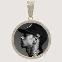 A 10k solid gold picture pendant with CZ stones frames a black-and-white profile photo of a man in a cap and chains, showing facial and neck tattoos.