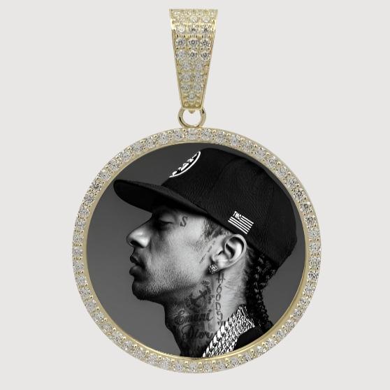 A 10k solid gold picture pendant with CZ stones frames a black-and-white profile photo of a man in a cap and chains, showing facial and neck tattoos.