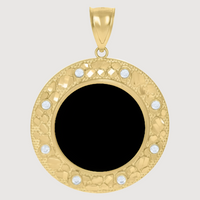 The 10k Solid Gold Picture Pendant Custom Medallion Frame features a round 10k gold design with a textured border, small white gemstones, a solid black center, and a top bail for attaching to a chain. Set against a light gray background.