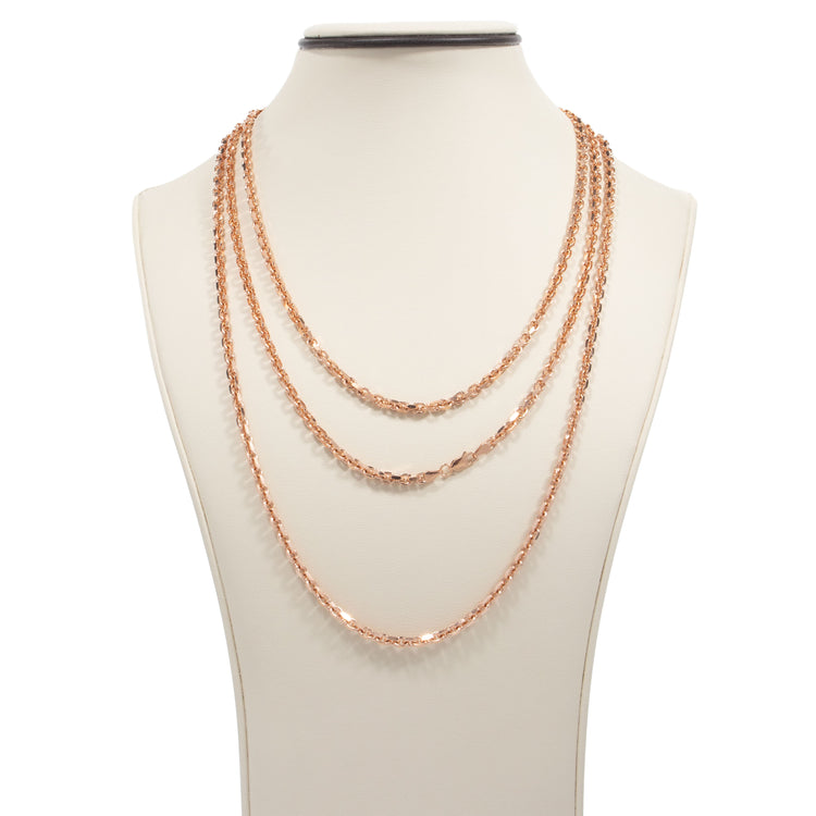 A display bust showcases the 3.5mm Solid Rose Gold Cable Link Chain, styled as a layered necklace with each 14K rose gold strand at different lengths for a cascading effect.