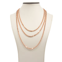 A display bust showcases the 3.5mm Solid Rose Gold Cable Link Chain, styled as a layered necklace with each 14K rose gold strand at different lengths for a cascading effect.