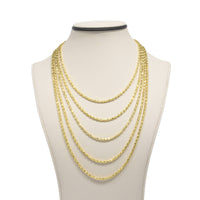 A display bust showcases the 3mm Barrel Crystal Chain, a 14k gold bonded necklace featuring elegant crystal accents on delicate, layered chains of varying lengths.