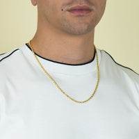A person wearing a white shirt with black trim and the 3mm Barrel Crystal Chain in 14k Gold Bonded, shown from the shoulders to just above the mouth against a light background.