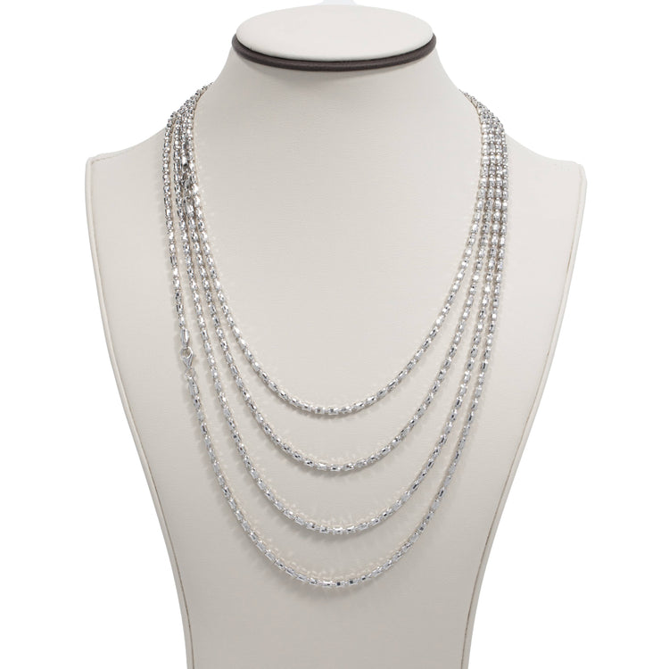 A display bust showcases the 3mm Barrel Crystal Chain—925 Silver, featuring five graduated strands of translucent beads gracefully layered for an elegant, sophisticated look.