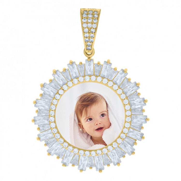 The Baguette Photo Frame Charm Pendant in 10k Solid Gold features a circular, diamond-studded design with a custom image of a smiling baby with brown hair wrapped in a white towel on a plain white background.