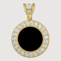 This Custom 10k Solid Gold Picture Pendant features a round design with a black center, sparkling CZ stones around the edge, and an ornate gold bail adorned with two more CZ stones—a truly striking and elegant piece.
