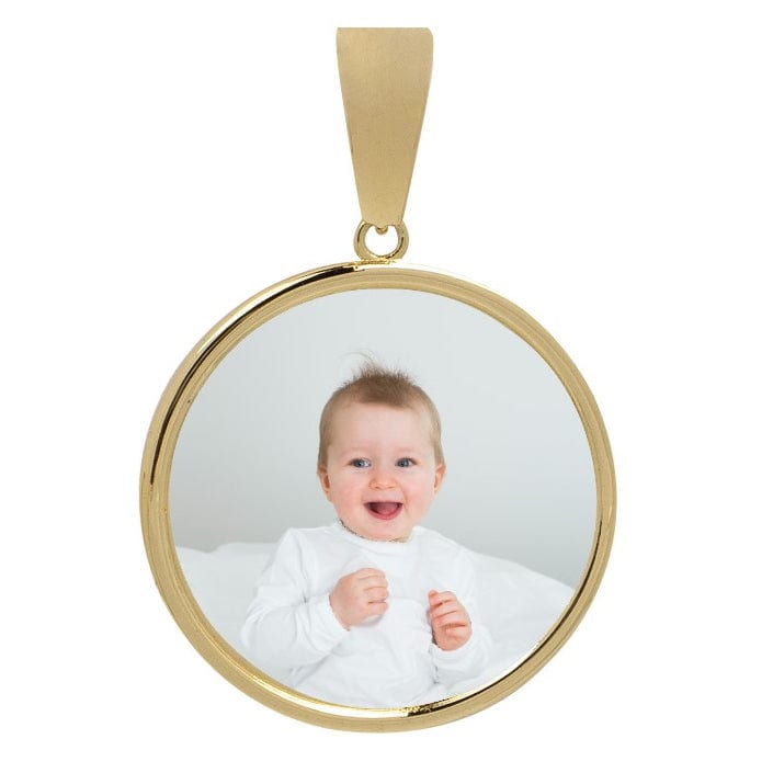 The 10k Solid Gold Picture Pendant - Customizable Medallion features a circular frame with your chosen photo, such as a smiling baby in a white outfit on a neutral background—a timeless keepsake.