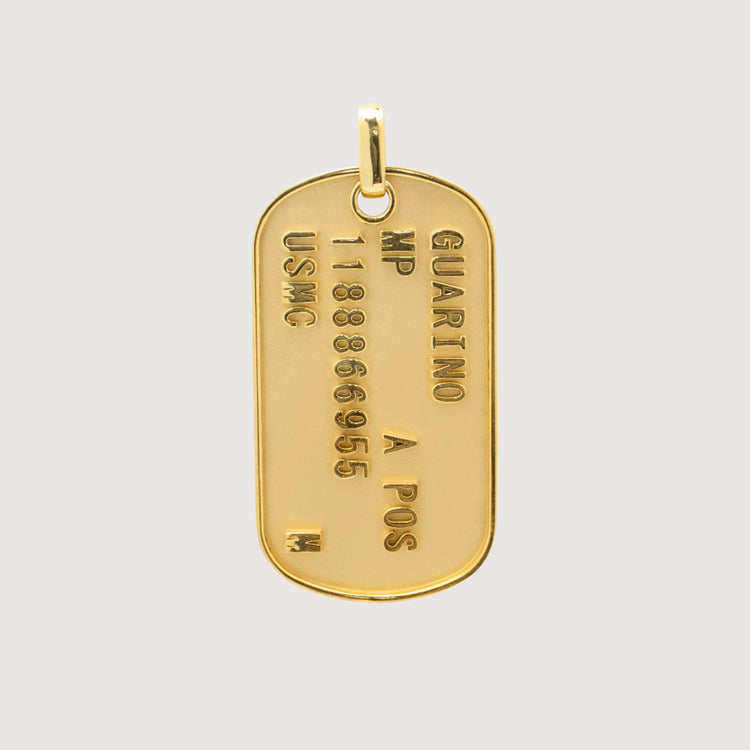 The Custom Military/Dog Tag Pendant with personalized engraving makes a meaningful accessory.