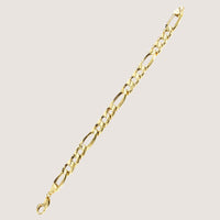 The Gold Figaro Bracelet - 6.5 mm features classic Italian design with alternating short and long links, crafted in radiant 14k gold, and is displayed diagonally on a plain light background.
