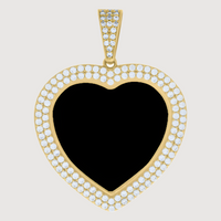The Heart Frame Charm Picture Pendant in 10k solid gold features a heart-shaped design with diamonds and can be personalized for a unique, meaningful keepsake.