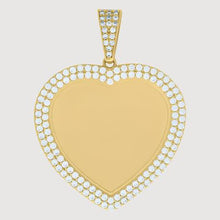  alt=" Discover elegance with our Heart Frame Picture Pendant in 10k gold. Insert a cherished photo for a personal touch to this timeless jewelry piece. "