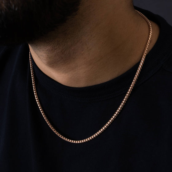 3mm - Diamond Cut Franco Chain - 14k Rose Gold Bonded | GOLDZENN- Front view detail of the chain when worn.
