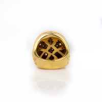 The Round Cluster Ring in Solid Gold is shown from the bottom, featuring an intricate lattice pattern with small round stones set into the design, displayed against a plain white background.