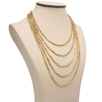 A beige necklace display bust shows five layered chain necklaces, including the Tricolor Milano Figarope Chain - 3.5mm 14k Solid Gold, featuring an elegant yellow, rose, and white gold Figarope design.