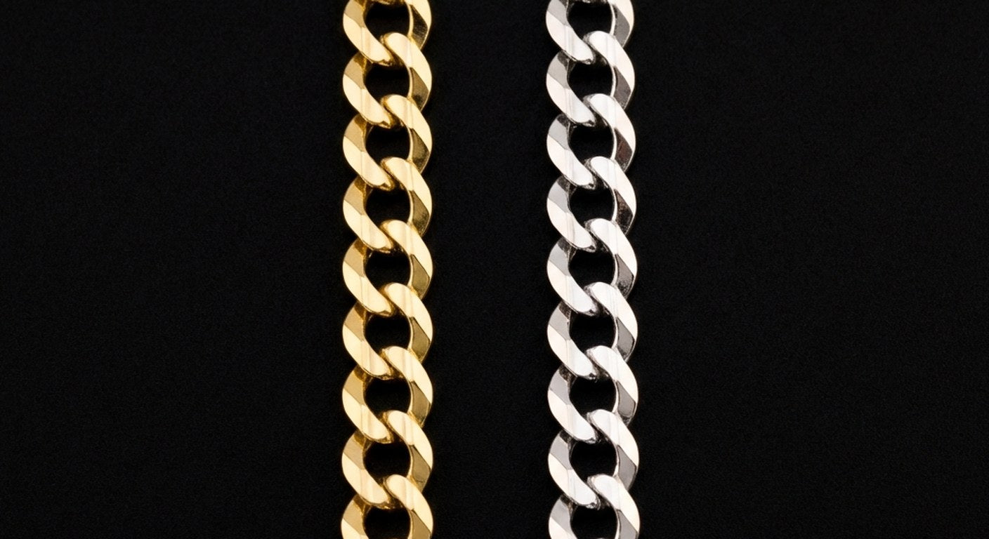 Yellow gold curb chain next to white gold curb chain showing the color difference between metals