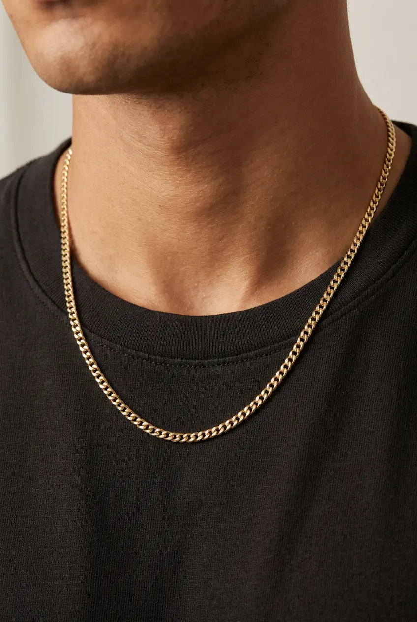 Man wearing thin 3mm Cuban link gold chain at 20-inch length showing subtle and refined styling